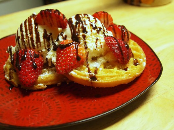 deep fried waffles with strawberries and chocolate